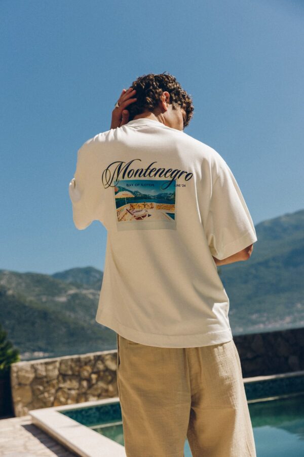 summer tshirt for men by costenza . Cream oversized men’s t-shirt with Montenegro Bay of Kotor graphic print, premium summer casual wear